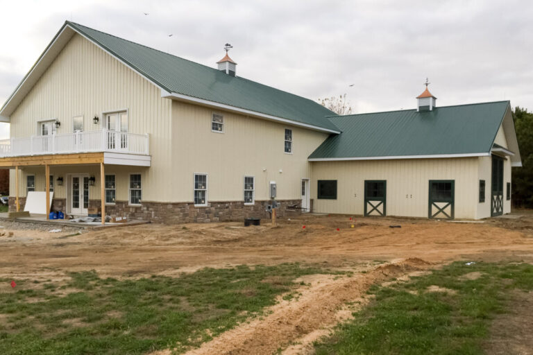 Horse barn with light siding