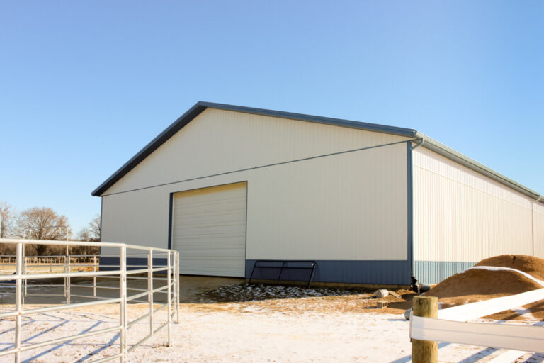 horse barn with light siding