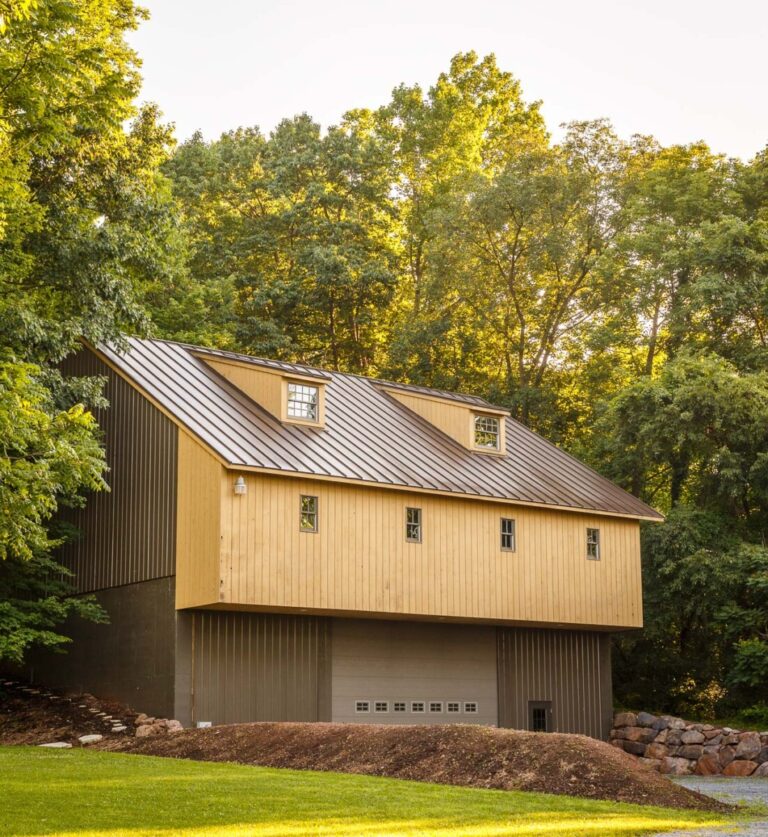 Bank barn with wood siding and metal roof