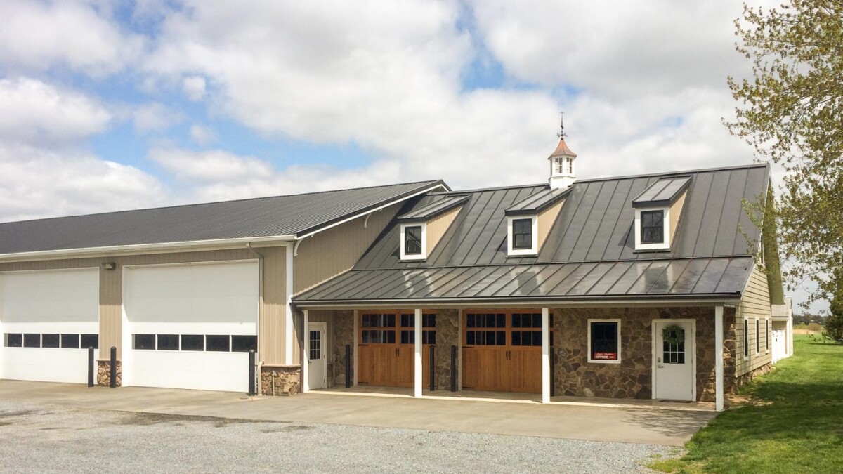 shop with large overhead doors connected to an office built by byler builders